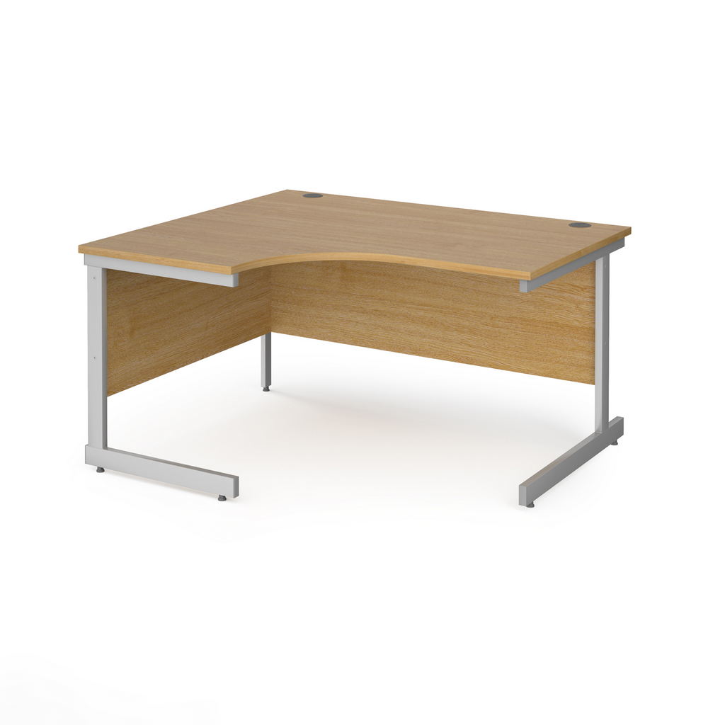 Picture of Contract 25 left hand ergonomic desk with silver cantilever leg 1400mm - oak top