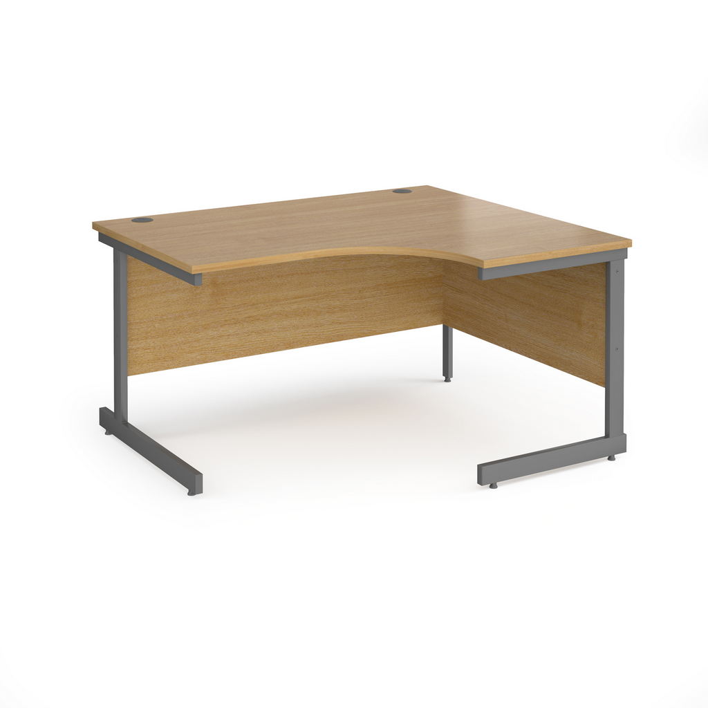 Picture of Contract 25 right hand ergonomic desk with graphite cantilever leg 1400mm - oak top