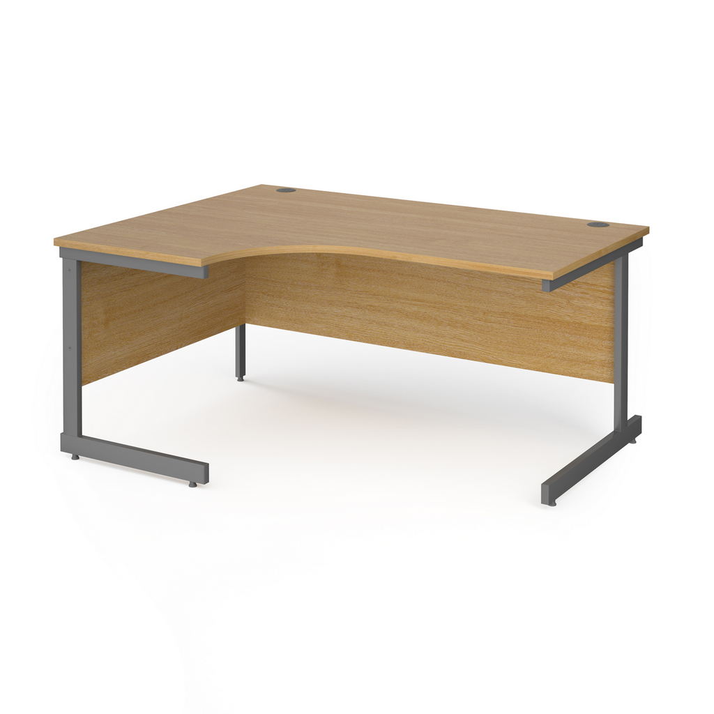 Picture of Contract 25 left hand ergonomic desk with graphite cantilever leg 1600mm - oak top