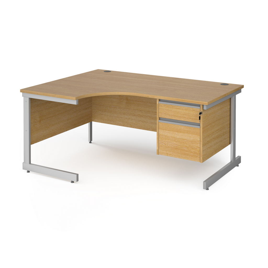 Picture of Contract 25 left hand ergonomic desk with 2 drawer pedestal and silver cantilever leg 1600mm - oak top