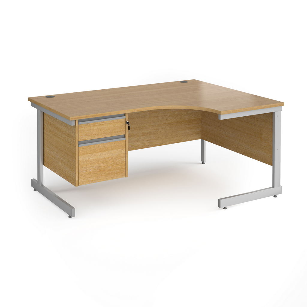 Picture of Contract 25 right hand ergonomic desk with 2 drawer pedestal and silver cantilever leg 1600mm - oak top