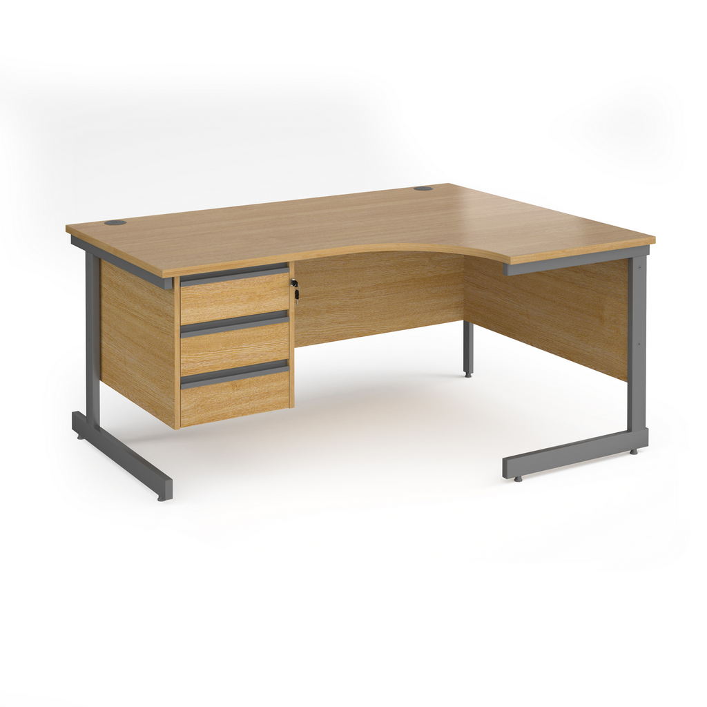 Picture of Contract 25 right hand ergonomic desk with 3 drawer pedestal and graphite cantilever leg 1600mm - oak top