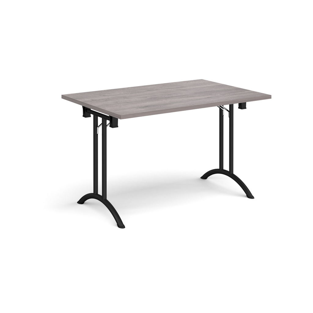 Picture of Rectangular folding leg table with black legs and curved foot rails 1200mm x 800mm - grey oak