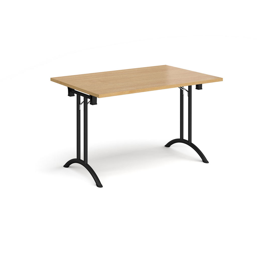 Picture of Rectangular folding leg table with black legs and curved foot rails 1200mm x 800mm - oak