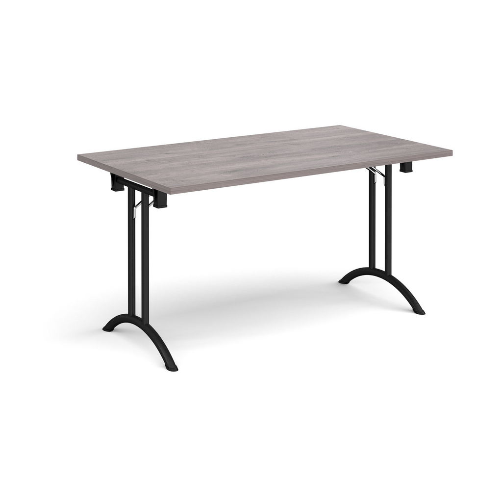 Picture of Rectangular folding leg table with black legs and curved foot rails 1400mm x 800mm - grey oak