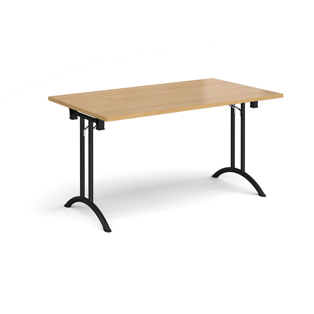 Picture of Rectangular folding leg table with black legs and curved foot rails 1400mm x 800mm - oak