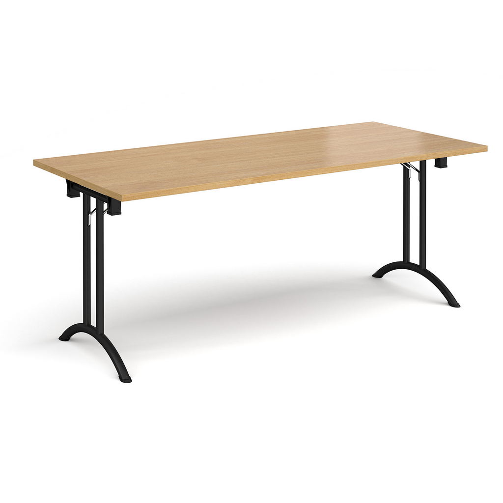 Picture of Rectangular folding leg table with black legs and curved foot rails 1800mm x 800mm - oak