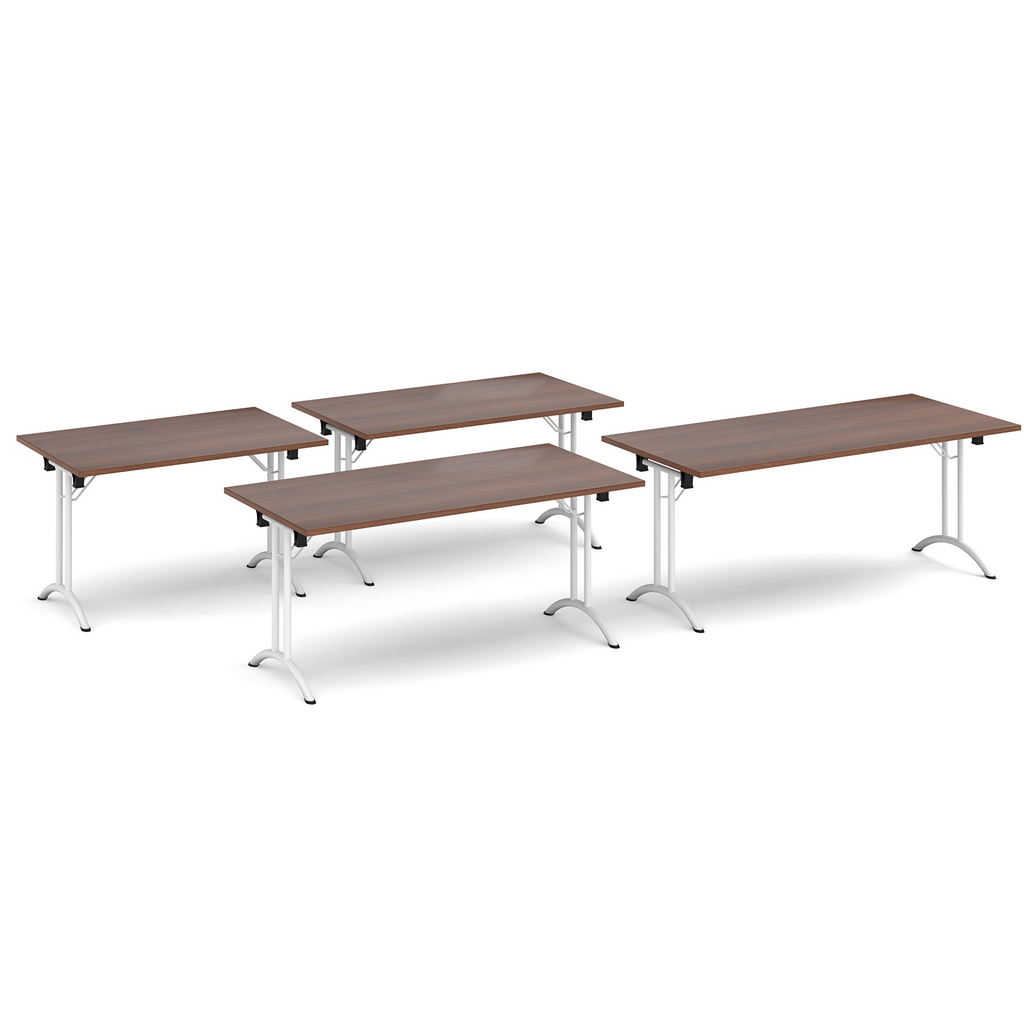 Picture of Rectangular folding leg table with black legs and curved foot rails 1800mm x 800mm - beech