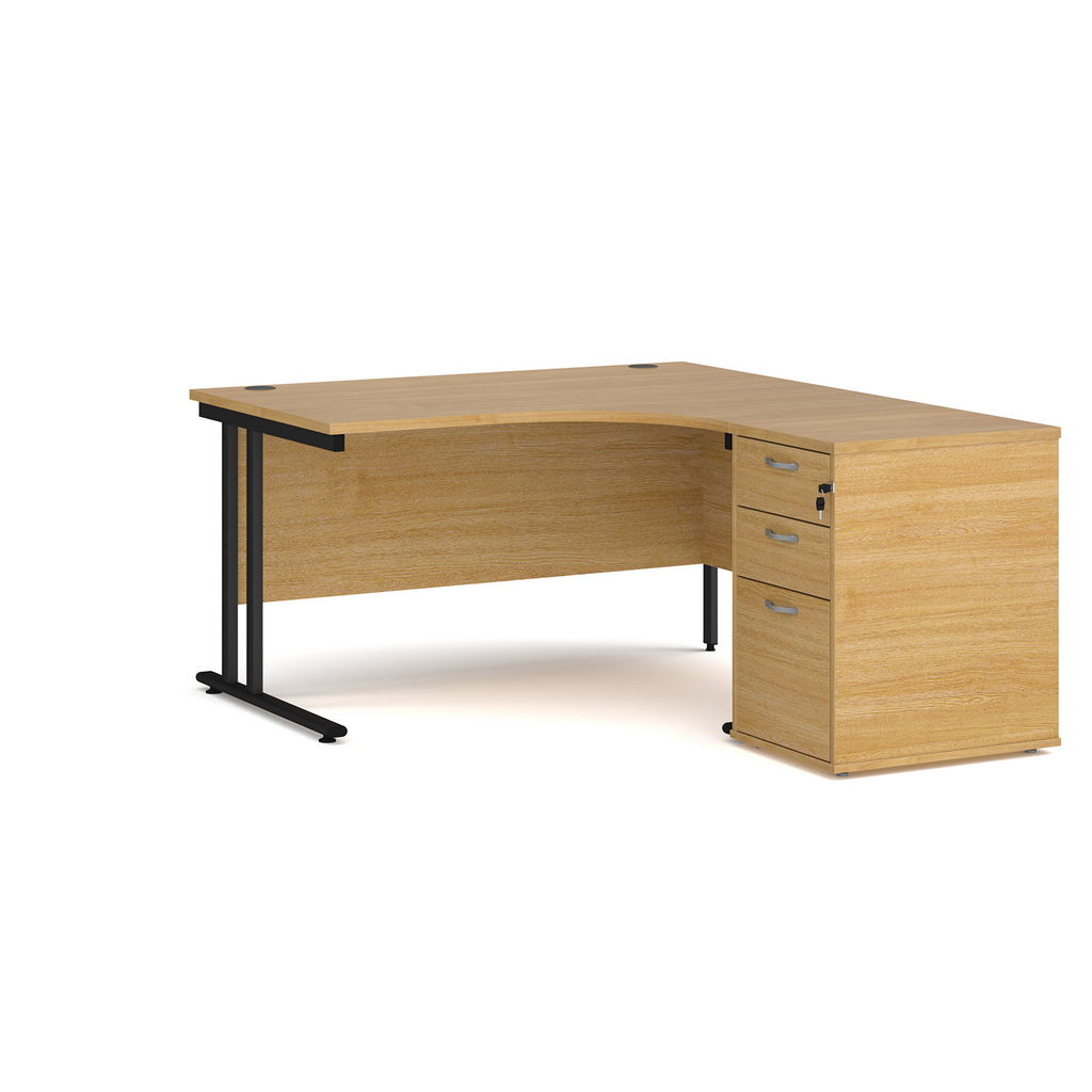 Picture of Maestro 25 right hand ergonomic desk 1400mm with black cantilever frame and desk high pedestal - oak