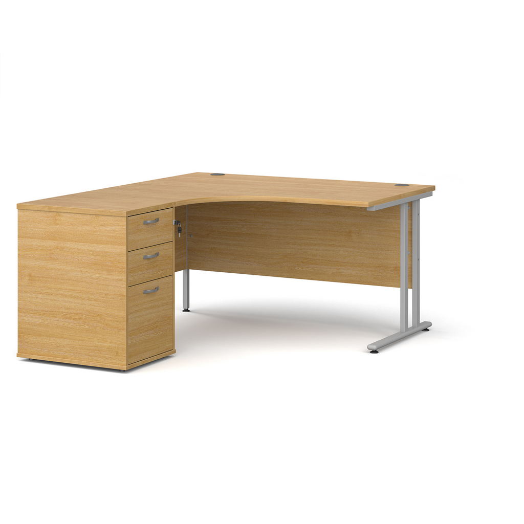 Picture of Maestro 25 left hand ergonomic desk 1400mm with silver cantilever frame and desk high pedestal - oak