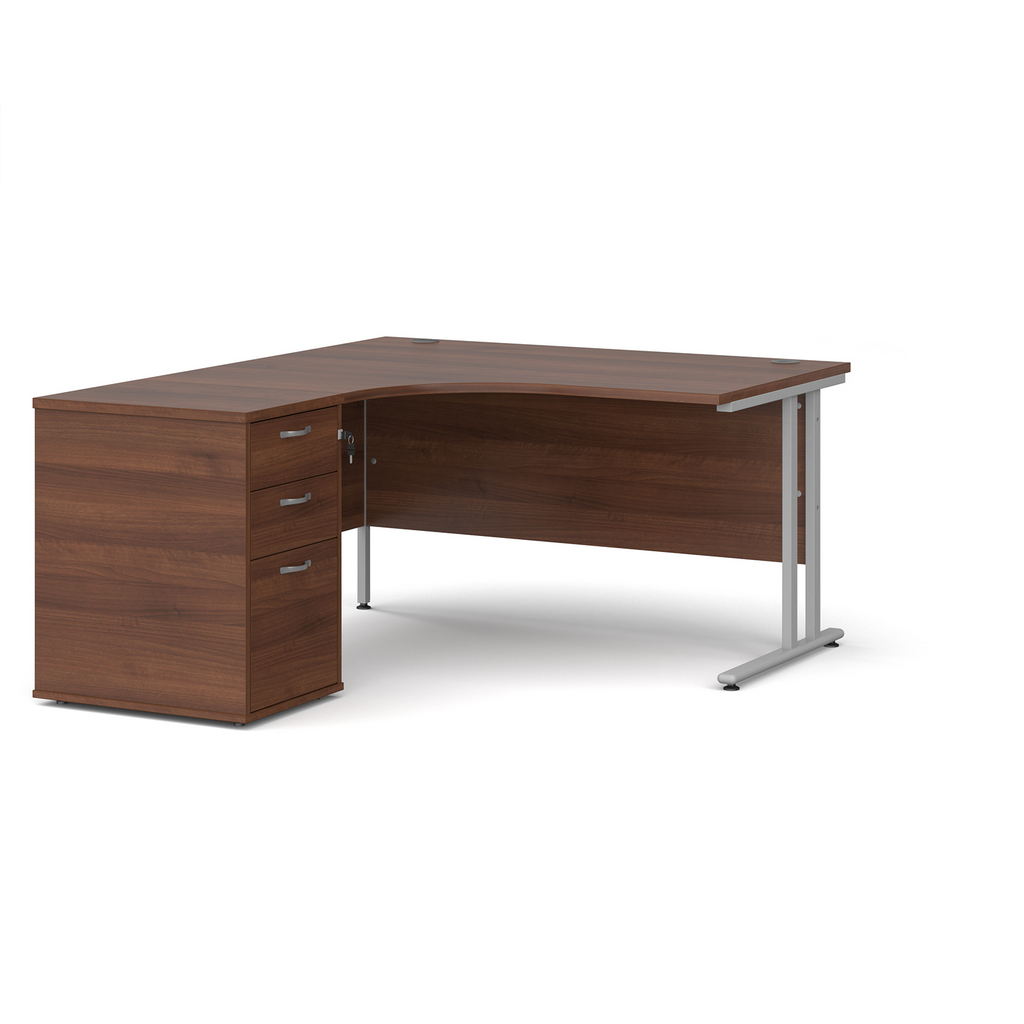 Picture of Maestro 25 left hand ergonomic desk 1400mm with silver cantilever frame and desk high pedestal - walnut