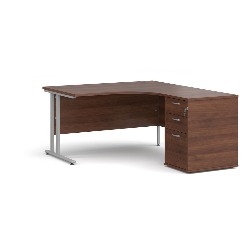 Picture of Maestro 25 right hand ergonomic desk 1400mm with silver cantilever frame and desk high pedestal - walnut