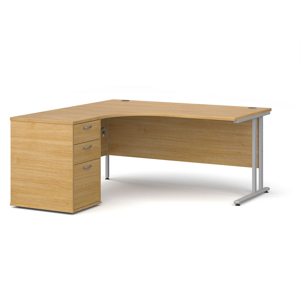 Picture of Maestro 25 left hand ergonomic desk 1600mm with silver cantilever frame and desk high pedestal - oak