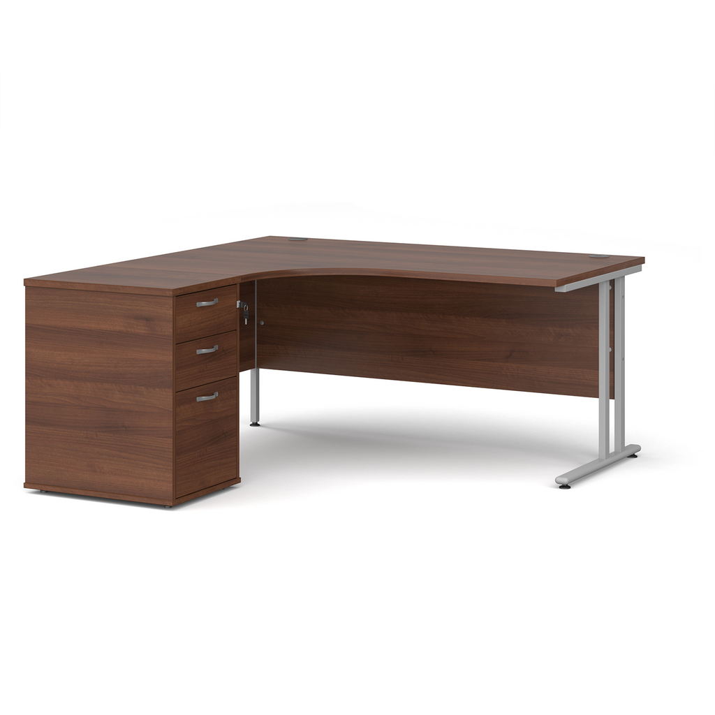 Picture of Maestro 25 left hand ergonomic desk 1600mm with silver cantilever frame and desk high pedestal - walnut
