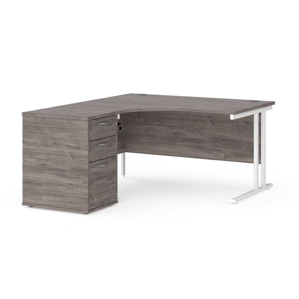 Picture of Maestro 25 left hand ergonomic desk 1400mm with white cantilever frame and desk high pedestal - grey oak