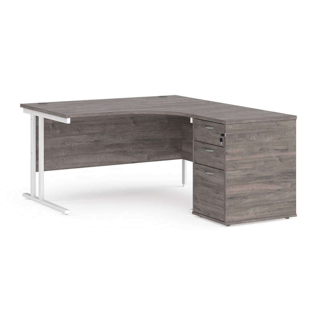 Picture of Maestro 25 right hand ergonomic desk 1400mm with white cantilever frame and desk high pedestal - grey oak