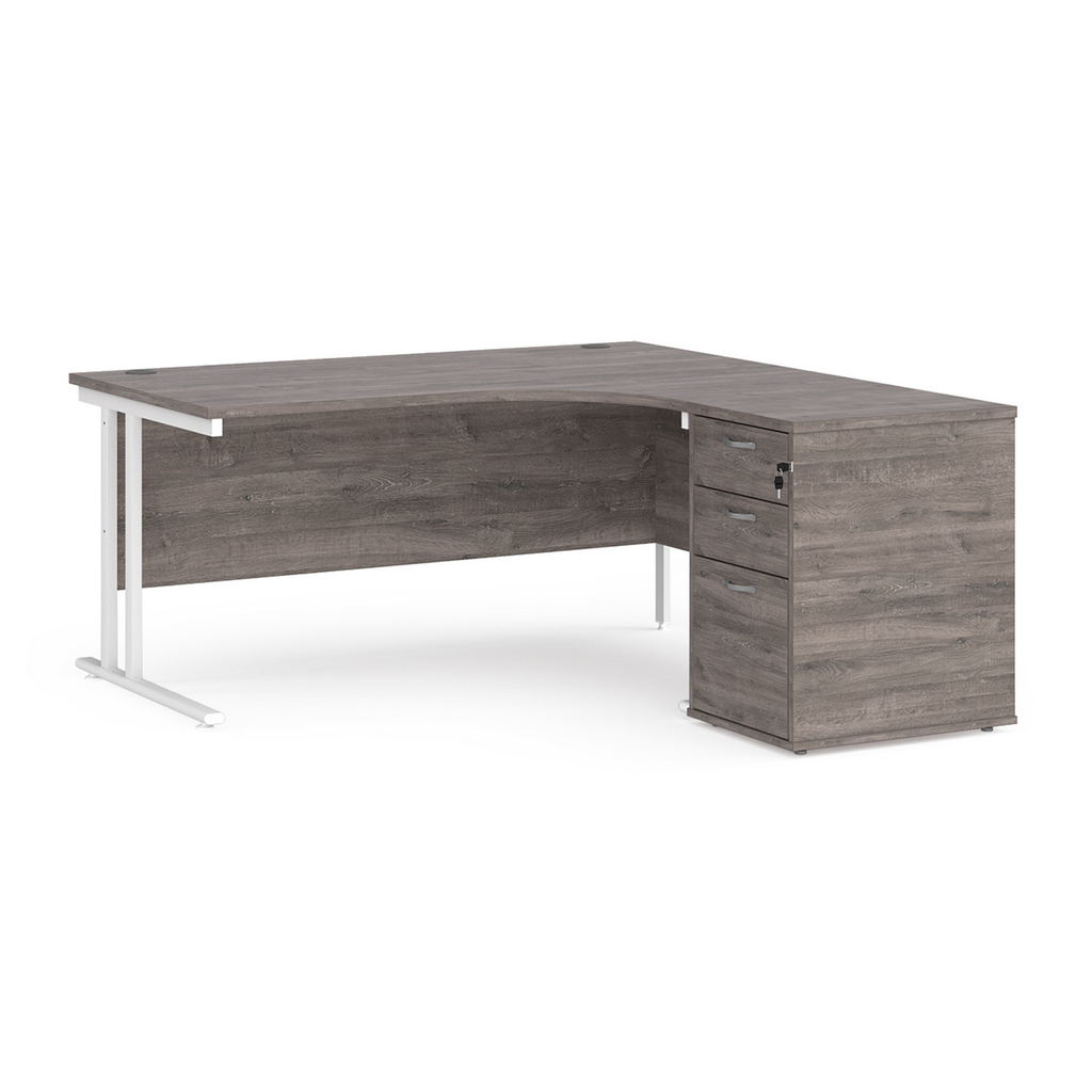 Picture of Maestro 25 right hand ergonomic desk 1600mm with white cantilever frame and desk high pedestal - grey oak
