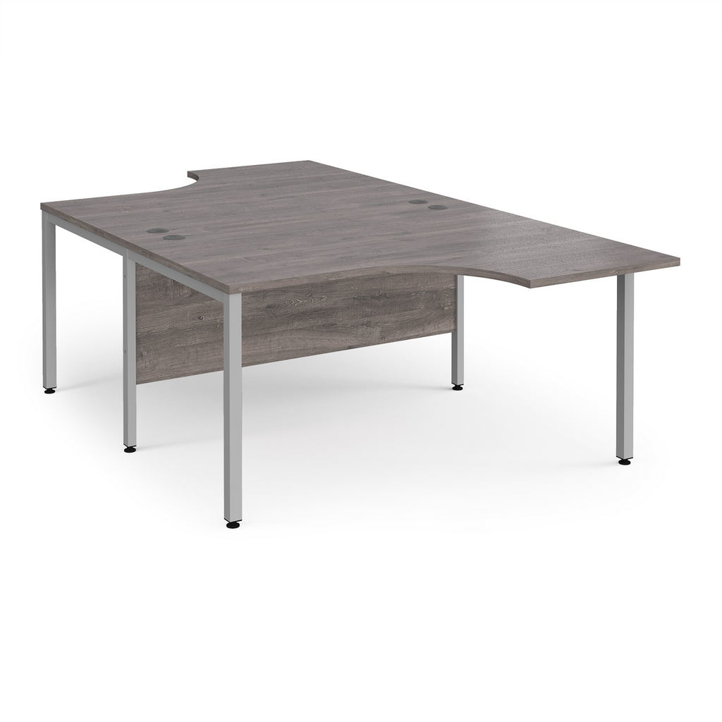 Picture of Maestro 25 back to back ergonomic desks 1400mm deep - silver bench leg frame, grey oak top