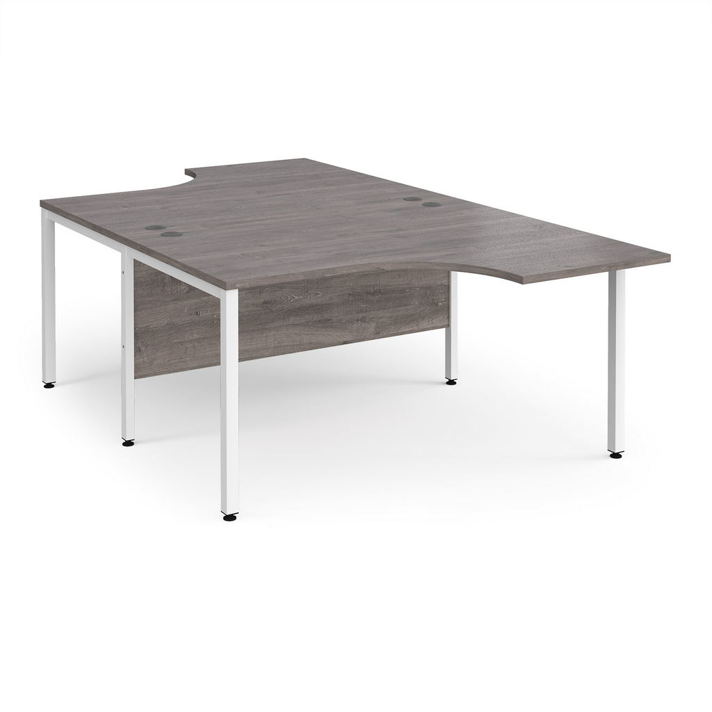 Picture of Maestro 25 back to back ergonomic desks 1400mm deep - white bench leg frame, grey oak top