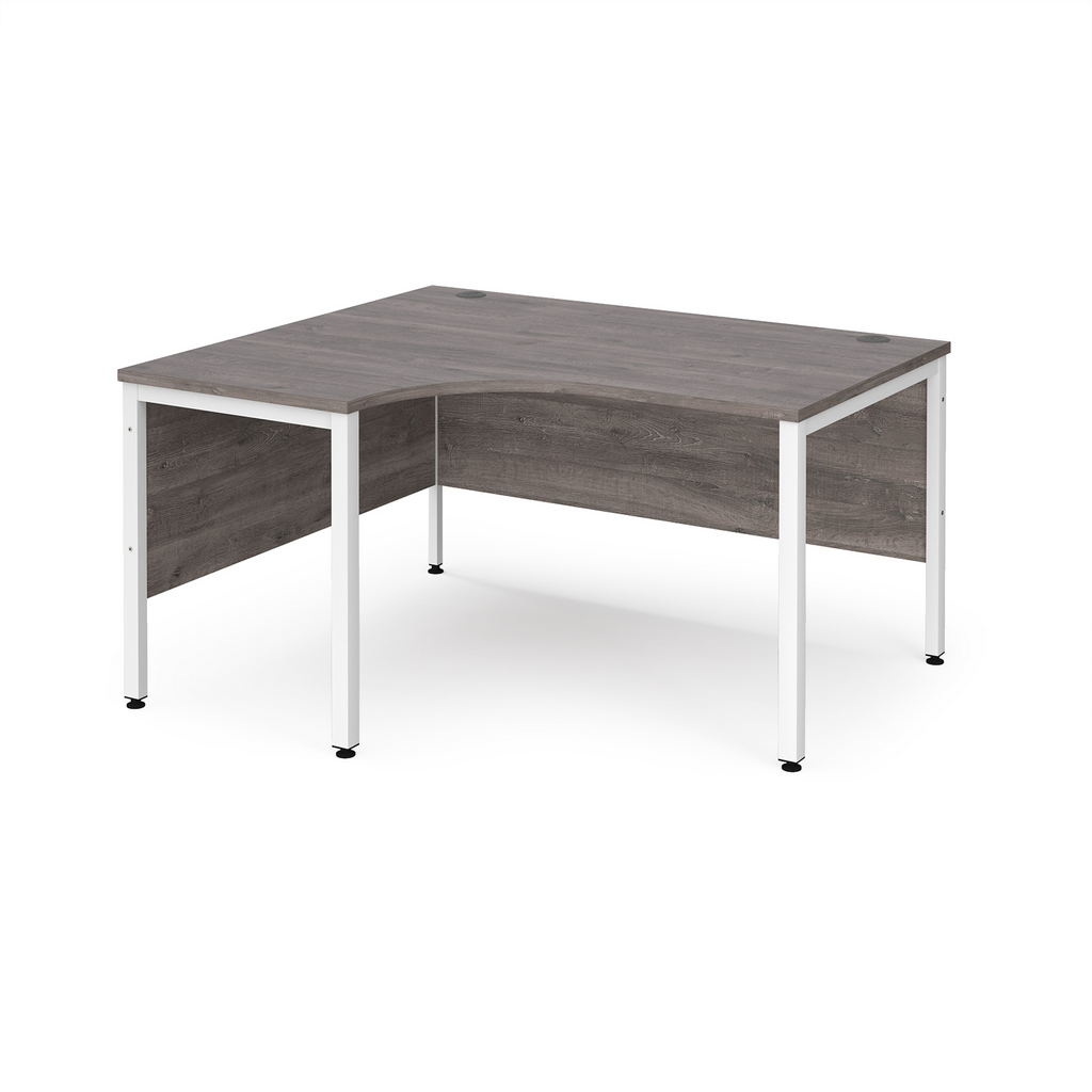 Picture of Maestro 25 left hand ergonomic desk 1400mm wide - white bench leg frame, grey oak top