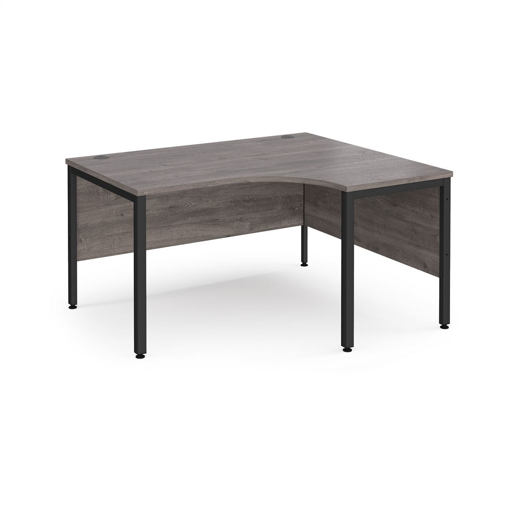 Picture of Maestro 25 right hand ergonomic desk 1400mm wide - black bench leg frame, grey oak top