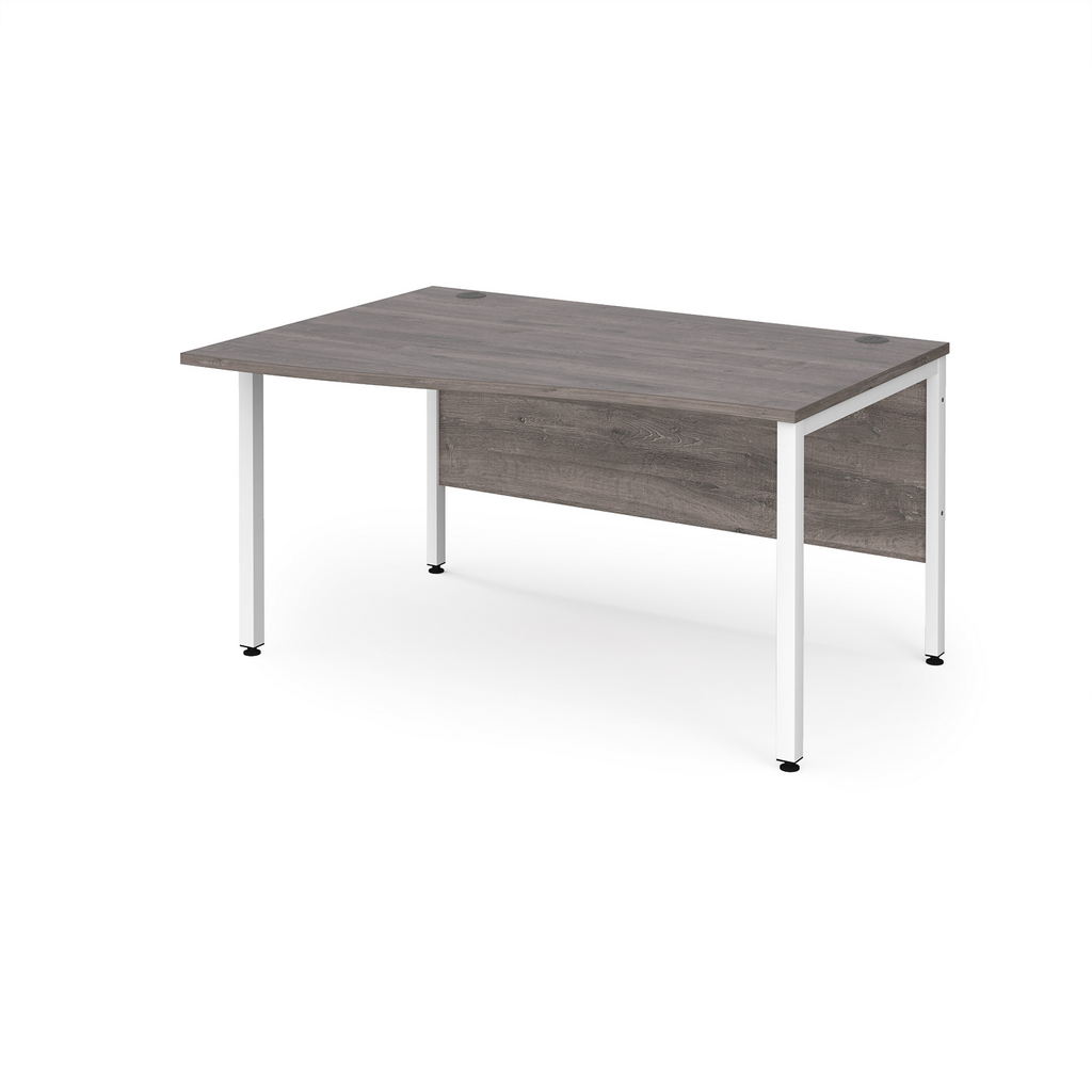 Picture of Maestro 25 left hand wave desk 1400mm wide - white bench leg frame, grey oak top