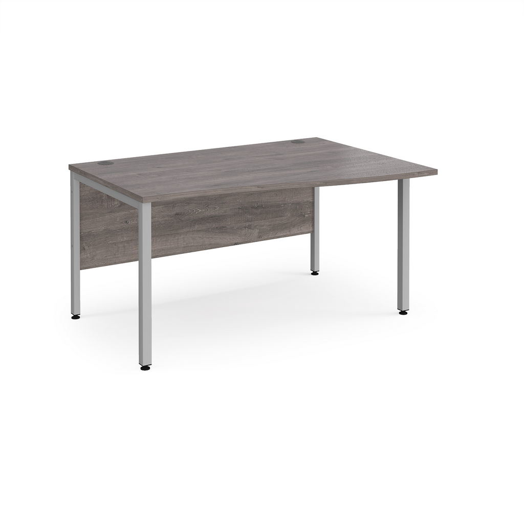 Picture of Maestro 25 right hand wave desk 1400mm wide - silver bench leg frame, grey oak top