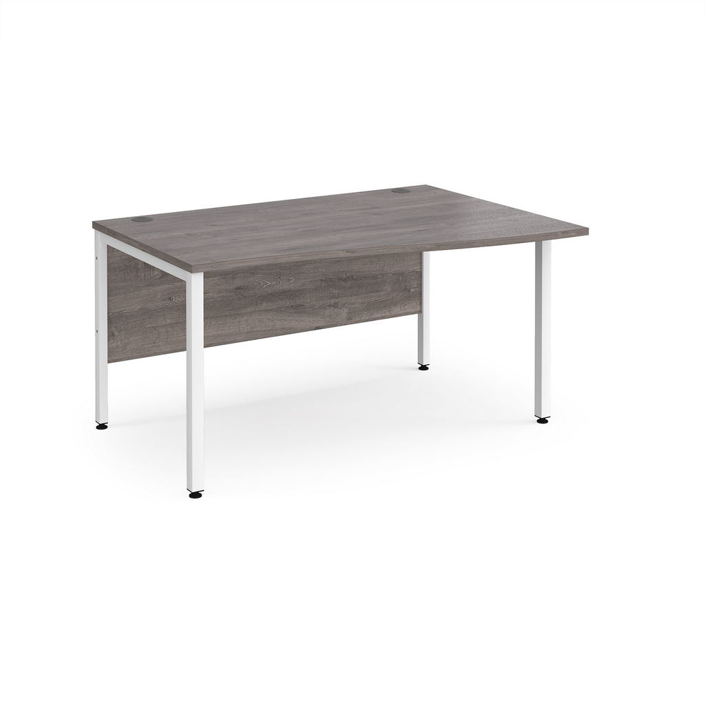 Picture of Maestro 25 right hand wave desk 1400mm wide - white bench leg frame, grey oak top