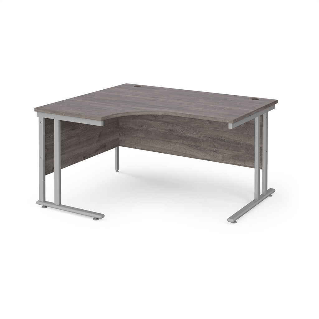 Picture of Maestro 25 left hand ergonomic desk 1400mm wide - silver cantilever leg frame, grey oak top