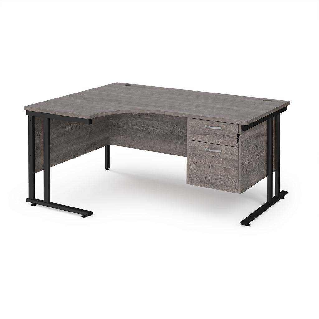 Picture of Maestro 25 left hand ergonomic desk 1600mm wide with 2 drawer pedestal - black cantilever leg frame, grey oak top