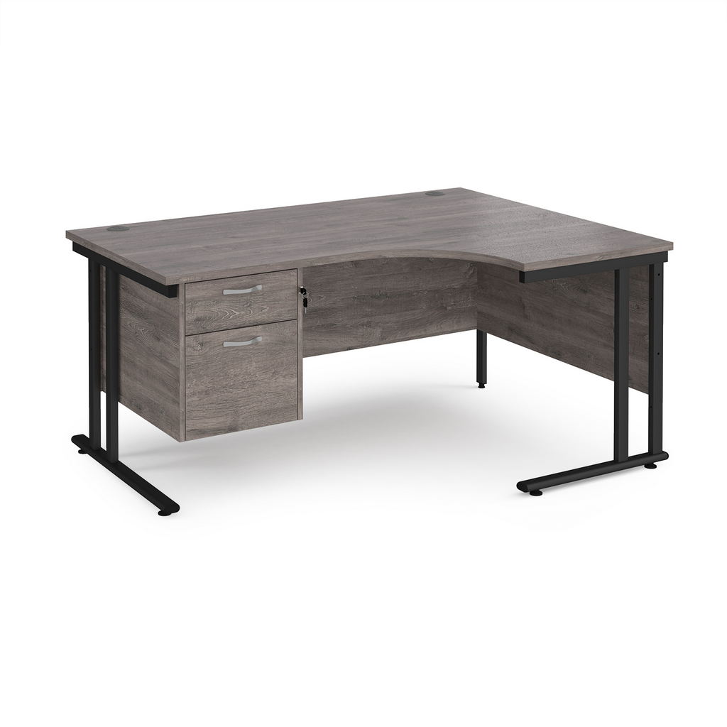 Picture of Maestro 25 right hand ergonomic desk 1600mm wide with 2 drawer pedestal - black cantilever leg frame, grey oak top