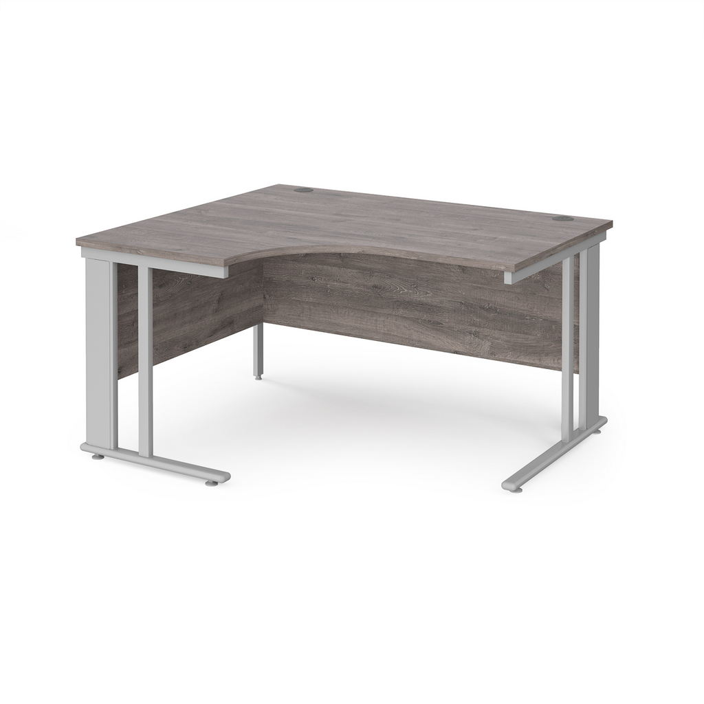 Picture of Maestro 25 left hand ergonomic desk 1400mm wide - silver cable managed leg frame, grey oak top