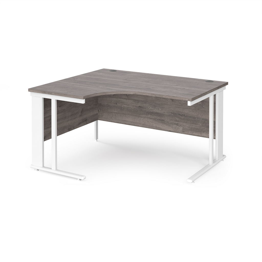 Picture of Maestro 25 left hand ergonomic desk 1400mm wide - white cable managed leg frame, grey oak top