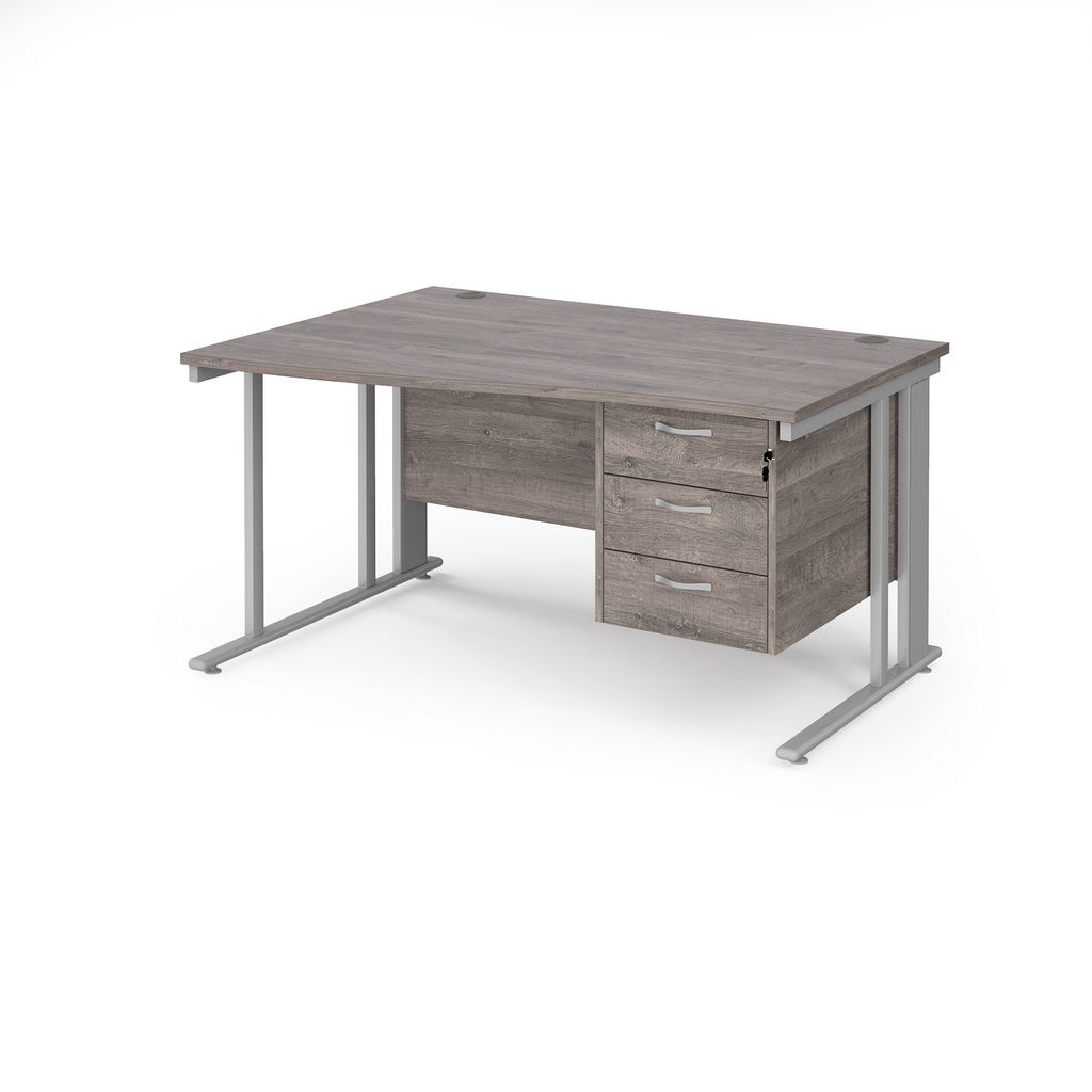 Picture of Maestro 25 left hand wave desk 1400mm wide with 3 drawer pedestal - silver cable managed leg frame, grey oak top