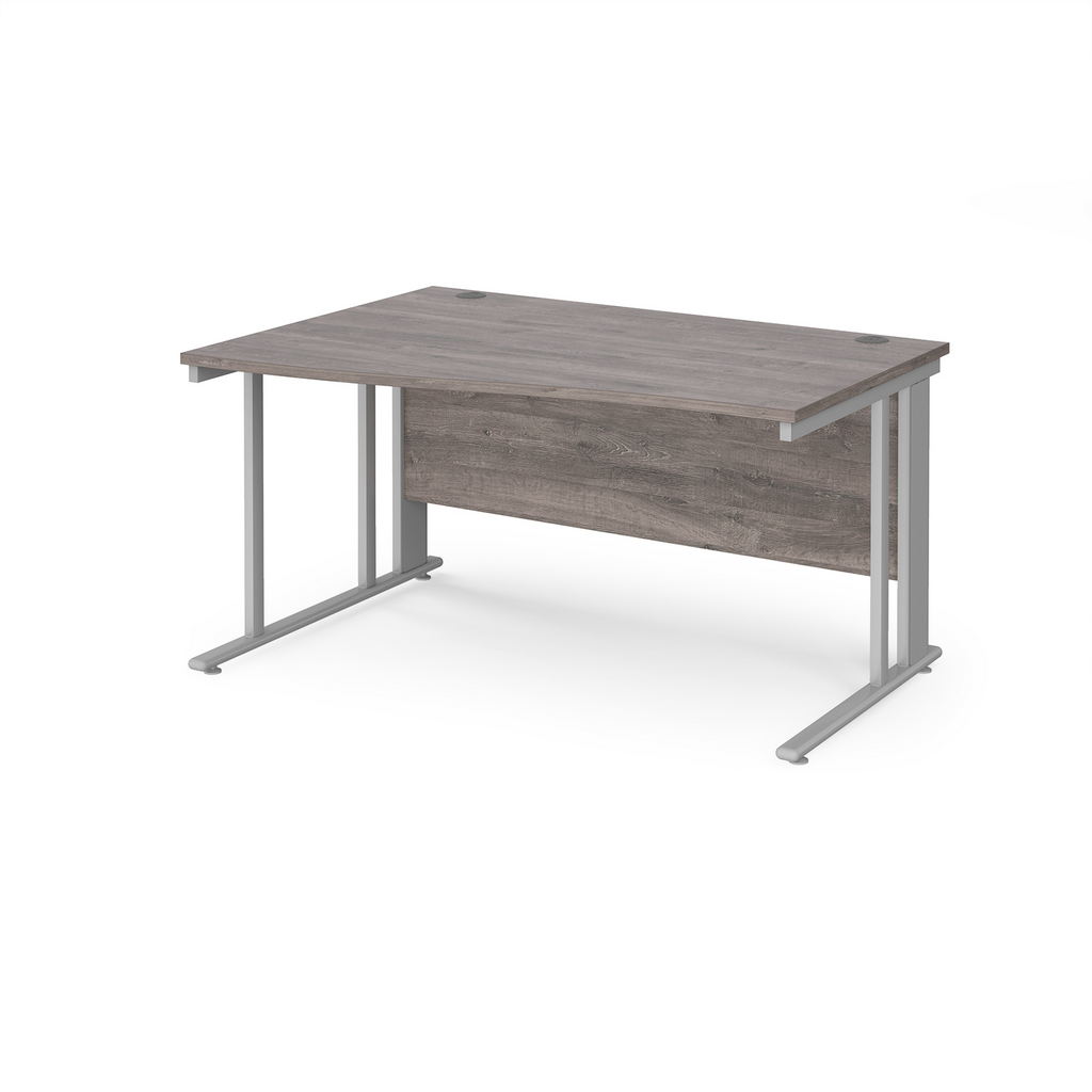 Picture of Maestro 25 left hand wave desk 1400mm wide - silver cable managed leg frame, grey oak top