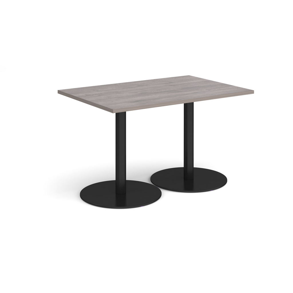 Picture of Monza rectangular dining table with flat round black bases 1200mm x 800mm - grey oak