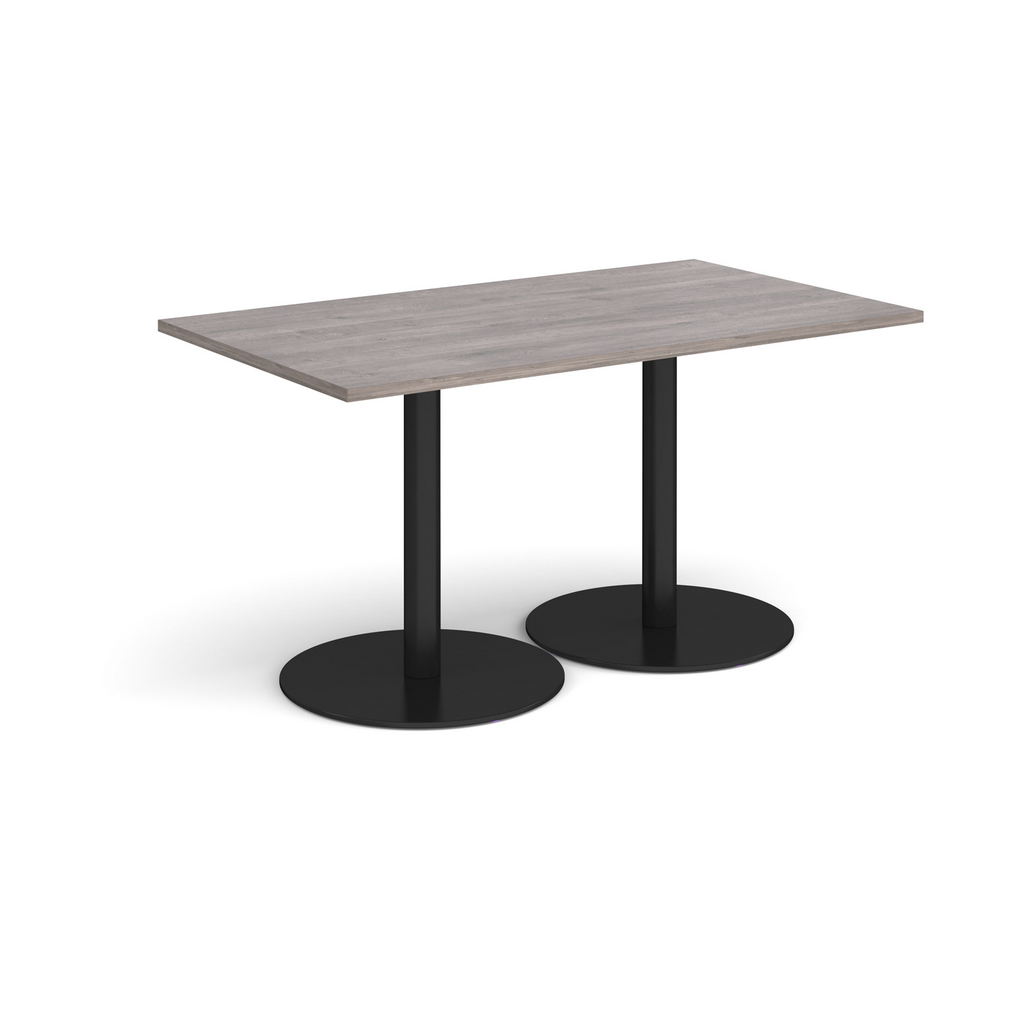 Picture of Monza rectangular dining table with flat round black bases 1400mm x 800mm - grey oak