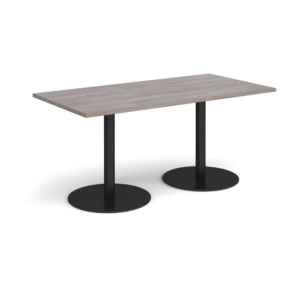 Picture of Monza rectangular dining table with flat round black bases 1600mm x 800mm - grey oak