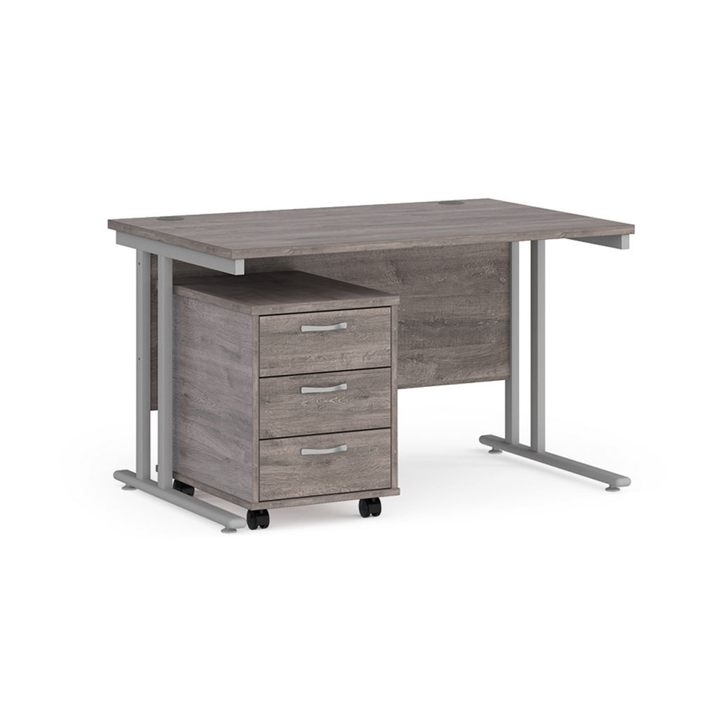 Picture of Maestro 25 straight desk 1200mm x 800mm with silver cantilever frame and 3 drawer pedestal - grey oak