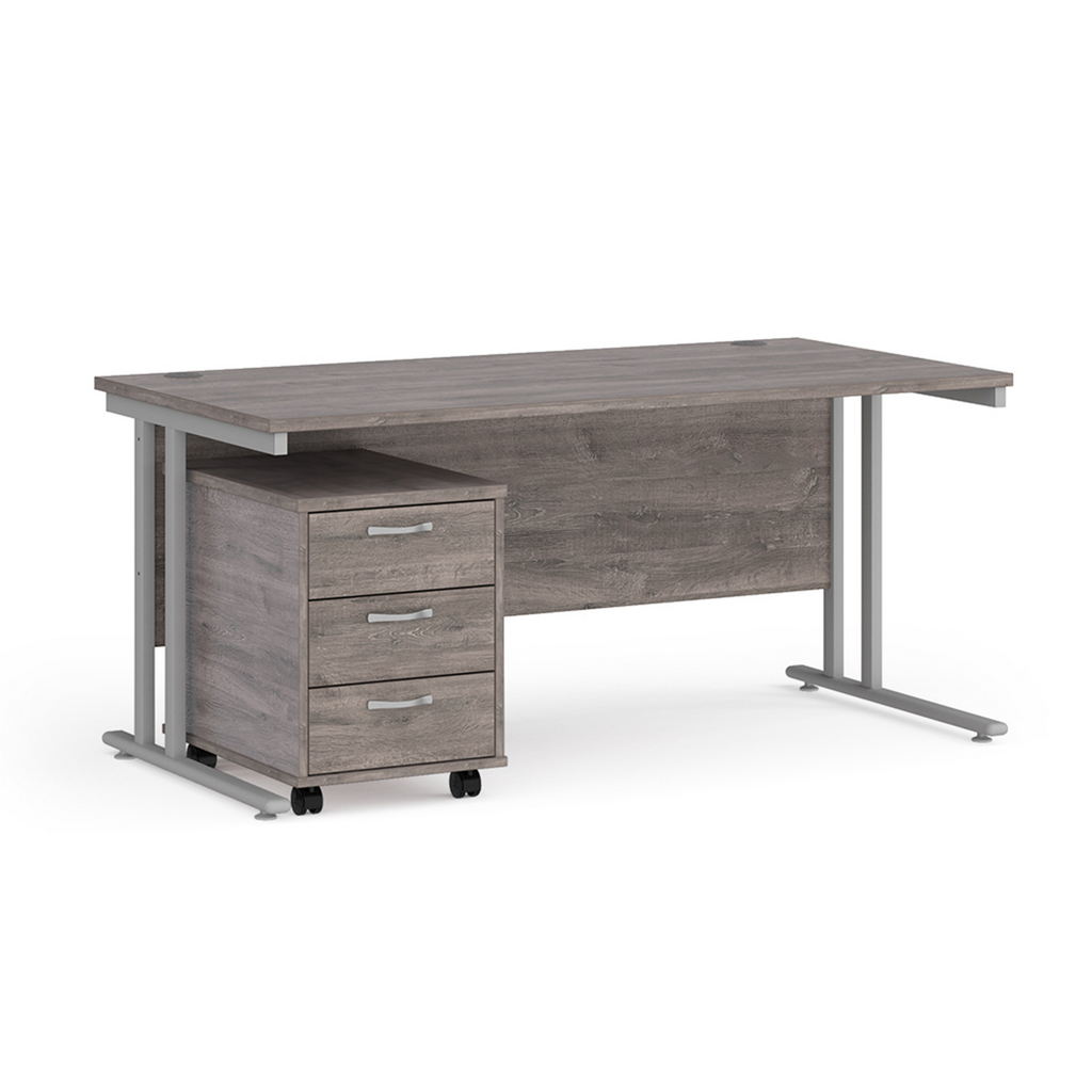 Picture of Maestro 25 straight desk 1600mm x 800mm with silver cantilever frame and 3 drawer pedestal - grey oak