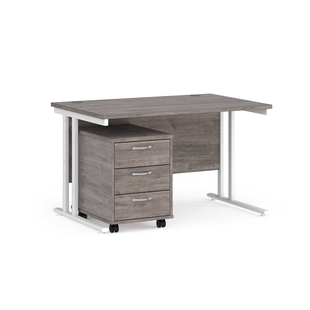 Picture of Maestro 25 straight desk 1200mm x 800mm with white cantilever frame and 3 drawer pedestal - grey oak