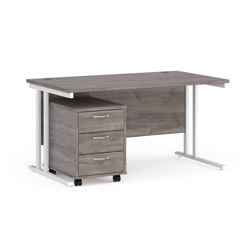 Picture of Maestro 25 straight desk 1400mm x 800mm with white cantilever frame and 3 drawer pedestal - grey oak